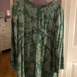 Pale green paisley dress.